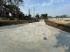 圖4 步道北側端點的虎頭溪與嘉南大圳交會處，經過排占清理，以石材雕刻地坪刻劃街道與水路紋理成為水痕廣場。
