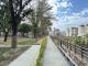 圖2新化體育公園更新，並透過無障礙斜坡道縫合北側水綠廊道，串聯2.3公里步道，讓公園__0